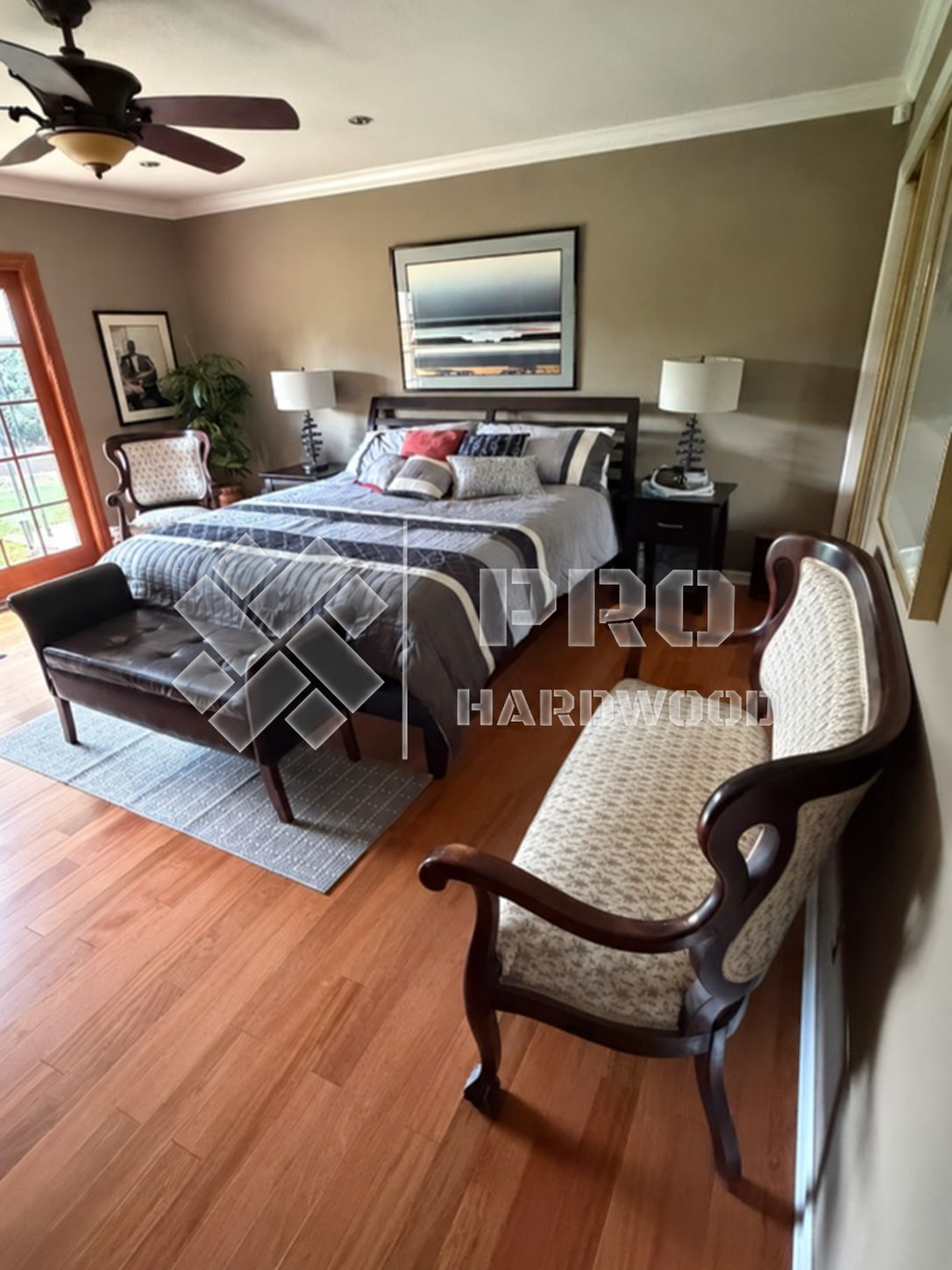 Brazilian Cherry hardwood flooring installed in a bedroom, view 3